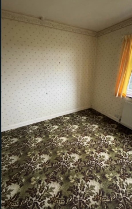 The same bedroom after HFC clearance — cleared and empty