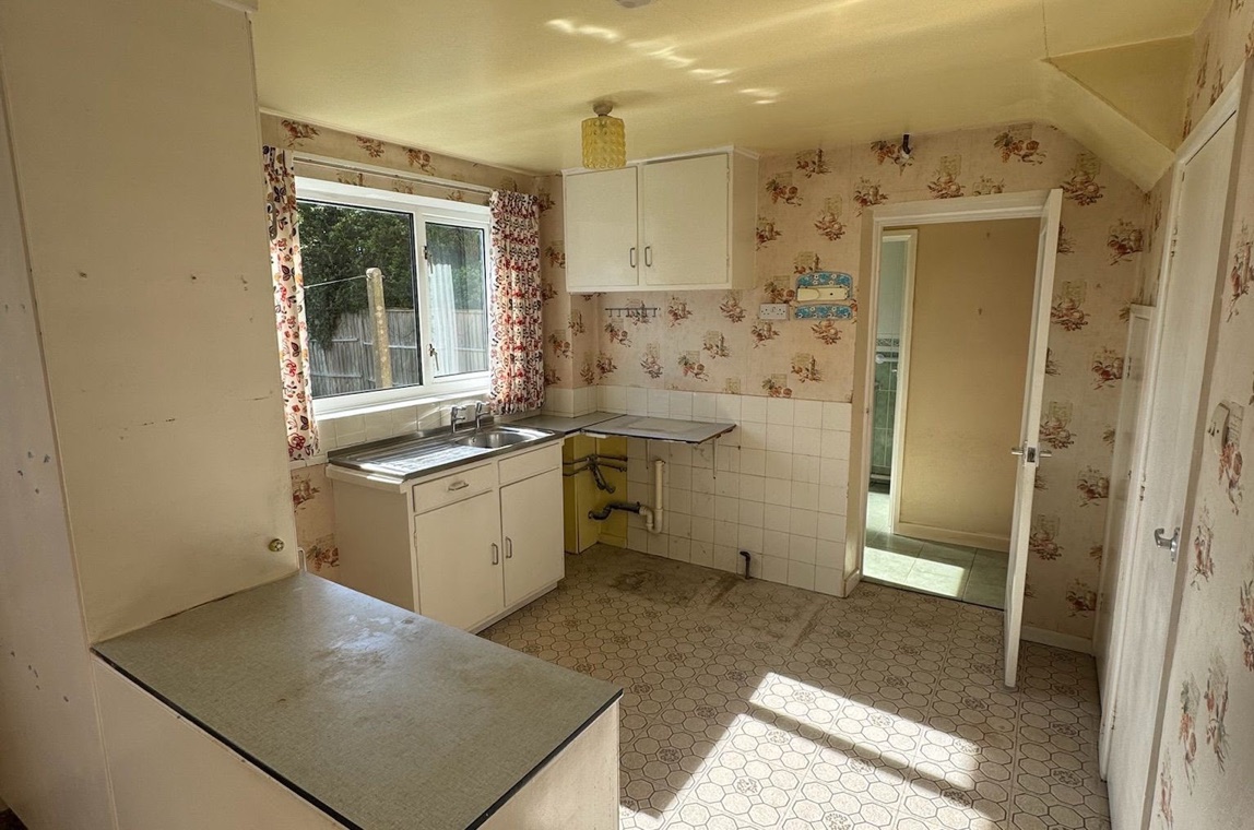 The same kitchen after HFC clearance — cleared and clean